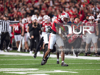 Wisconsin Badgers wide receiver Vinny Anthony II #8 catches a long pass against the Oregon Ducks at Camp Randall Stadium in Madison, Wiscons...