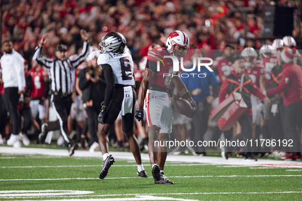 Wisconsin Badgers wide receiver Vinny Anthony II #8 catches a long pass against the Oregon Ducks at Camp Randall Stadium in Madison, Wiscons...