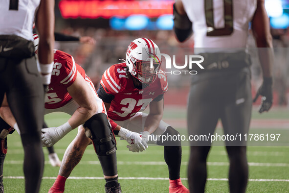 Wisconsin Badgers tight end Riley Nowakowski #37 observes the Oregon Ducks defense before an extra point attempt at Camp Randall Stadium in...