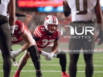 Wisconsin Badgers tight end Riley Nowakowski #37 observes the Oregon Ducks defense before an extra point attempt at Camp Randall Stadium in...