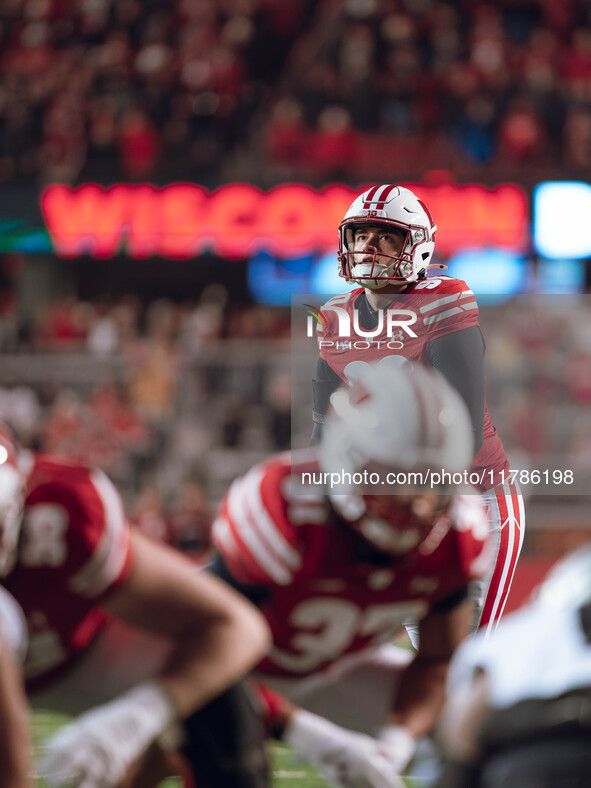 Wisconsin Badgers kicker Nathanial Vakos #90 looks up at the goalpost before kicking an extra point against the Oregon Ducks at Camp Randall...