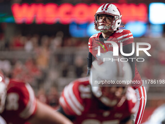 Wisconsin Badgers kicker Nathanial Vakos #90 looks up at the goalpost before kicking an extra point against the Oregon Ducks at Camp Randall...