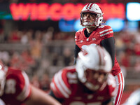 Wisconsin Badgers kicker Nathanial Vakos #90 looks up at the goalpost before kicking an extra point against the Oregon Ducks at Camp Randall...