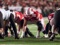 Wisconsin Badgers offensive lineman JP Benzschawel #67 takes a stance before an extra point against the Oregon Ducks at Camp Randall Stadium...