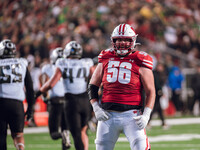 Wisconsin Badgers offensive lineman Joe Brunner #56 celebrates a score against the Oregon Ducks at Camp Randall Stadium in Madison, Wisconsi...