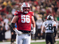 Wisconsin Badgers offensive lineman Joe Brunner #56 celebrates a score against the Oregon Ducks at Camp Randall Stadium in Madison, Wisconsi...