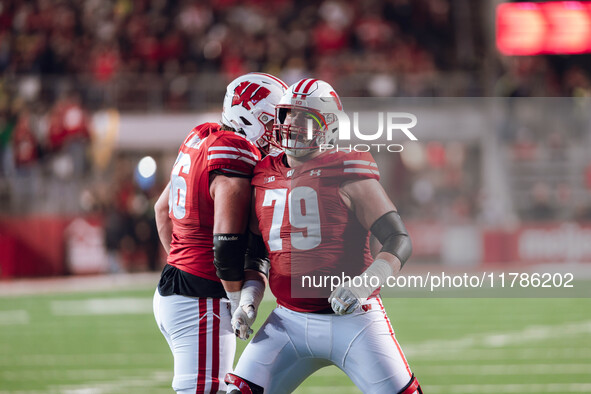 Wisconsin Badgers offensive lineman Joe Brunner #56 and Wisconsin Badgers offensive lineman Jack Nelson #79 celebrate a score against the Or...