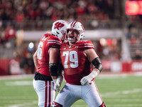 Wisconsin Badgers offensive lineman Joe Brunner #56 and Wisconsin Badgers offensive lineman Jack Nelson #79 celebrate a score against the Or...