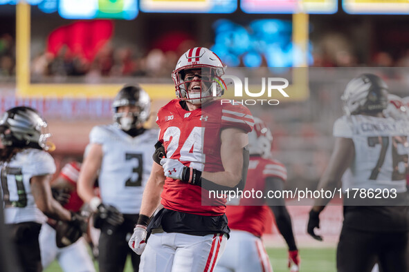 Wisconsin Badgers safety Hunter Wohler #24 celebrates a defensive stop against the Oregon Ducks at Camp Randall Stadium in Madison, Wisconsi...