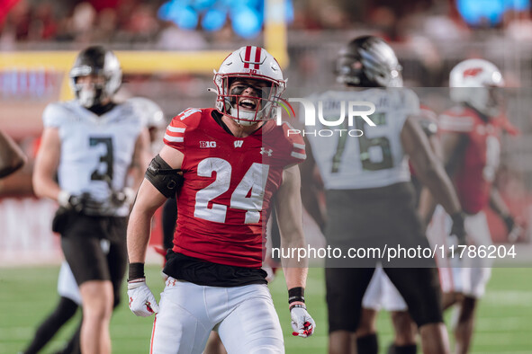 Wisconsin Badgers safety Hunter Wohler #24 celebrates a defensive stop against the Oregon Ducks at Camp Randall Stadium in Madison, Wisconsi...