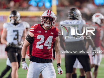 Wisconsin Badgers safety Hunter Wohler #24 celebrates a defensive stop against the Oregon Ducks at Camp Randall Stadium in Madison, Wisconsi...