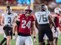 Wisconsin Badgers safety Hunter Wohler #24 celebrates a defensive stop against the Oregon Ducks at Camp Randall Stadium in Madison, Wisconsi...