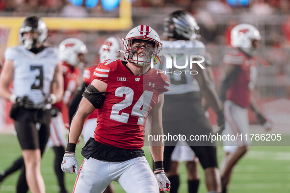 Wisconsin Badgers safety Hunter Wohler #24 celebrates a defensive stop against the Oregon Ducks at Camp Randall Stadium in Madison, Wisconsi...