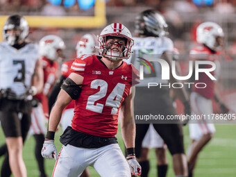 Wisconsin Badgers safety Hunter Wohler #24 celebrates a defensive stop against the Oregon Ducks at Camp Randall Stadium in Madison, Wisconsi...