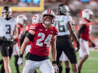 Wisconsin Badgers safety Hunter Wohler #24 celebrates a defensive stop against the Oregon Ducks at Camp Randall Stadium in Madison, Wisconsi...