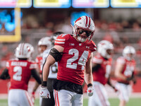 Wisconsin Badgers safety Hunter Wohler #24 celebrates a defensive stop against the Oregon Ducks at Camp Randall Stadium in Madison, Wisconsi...