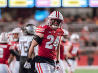 Wisconsin Badgers safety Hunter Wohler #24 celebrates a defensive stop against the Oregon Ducks at Camp Randall Stadium in Madison, Wisconsi...