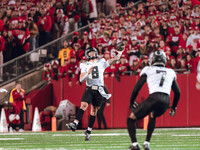 Oregon quarterback Dillon Gabriel #8 throws a pass downfield against the Wisconsin Badgers at Camp Randall Stadium in Madison, Wisconsin, on...