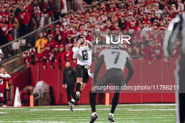 Oregon quarterback Dillon Gabriel #8 throws a pass downfield against the Wisconsin Badgers at Camp Randall Stadium in Madison, Wisconsin, on...