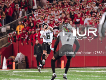 Oregon quarterback Dillon Gabriel #8 throws a pass downfield against the Wisconsin Badgers at Camp Randall Stadium in Madison, Wisconsin, on...