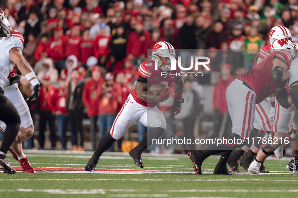 Wisconsin Badgers running back Tawee Walker #3 finds the hole against the Oregon Ducks defense at Camp Randall Stadium in Madison, Wisconsin...