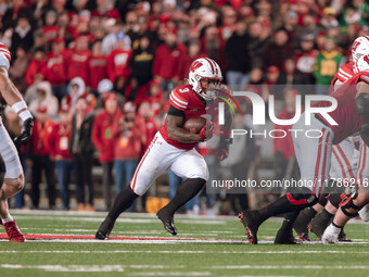 Wisconsin Badgers running back Tawee Walker #3 finds the hole against the Oregon Ducks defense at Camp Randall Stadium in Madison, Wisconsin...