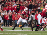 Wisconsin Badgers running back Tawee Walker #3 finds the hole against the Oregon Ducks defense at Camp Randall Stadium in Madison, Wisconsin...