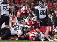 Wisconsin Badgers running back Tawee Walker #3 looks towards the 4th down marker against the Oregon Ducks defense at Camp Randall Stadium in...