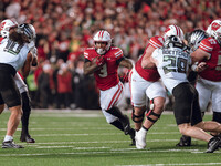 Wisconsin Badgers running back Tawee Walker #3 finds the hole against the Oregon Ducks defense at Camp Randall Stadium in Madison, Wisconsin...