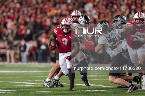 Wisconsin Badgers running back Tawee Walker #3 finds the hole against the Oregon Ducks defense at Camp Randall Stadium in Madison, Wisconsin...