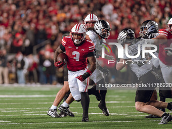 Wisconsin Badgers running back Tawee Walker #3 finds the hole against the Oregon Ducks defense at Camp Randall Stadium in Madison, Wisconsin...