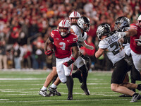 Wisconsin Badgers running back Tawee Walker #3 finds the hole against the Oregon Ducks defense at Camp Randall Stadium in Madison, Wisconsin...