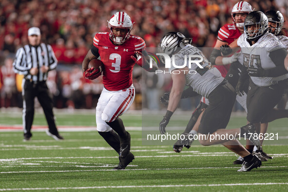 Wisconsin Badgers running back Tawee Walker #3 finds the hole against the Oregon Ducks defense at Camp Randall Stadium in Madison, Wisconsin...