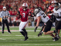 Wisconsin Badgers running back Tawee Walker #3 finds the hole against the Oregon Ducks defense at Camp Randall Stadium in Madison, Wisconsin...