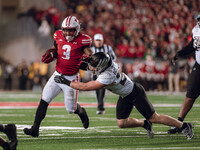 Wisconsin Badgers running back Tawee Walker #3 finds the hole against the Oregon Ducks defense at Camp Randall Stadium in Madison, Wisconsin...