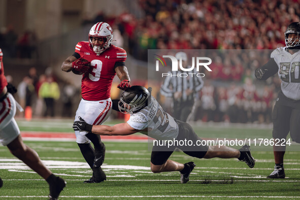 Wisconsin Badgers running back Tawee Walker #3 finds the hole against the Oregon Ducks defense at Camp Randall Stadium in Madison, Wisconsin...