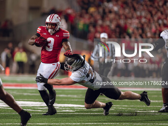 Wisconsin Badgers running back Tawee Walker #3 finds the hole against the Oregon Ducks defense at Camp Randall Stadium in Madison, Wisconsin...