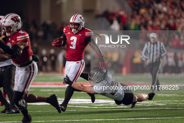 Wisconsin Badgers running back Tawee Walker #3 finds the hole against the Oregon Ducks defense at Camp Randall Stadium in Madison, Wisconsin...