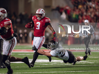 Wisconsin Badgers running back Tawee Walker #3 finds the hole against the Oregon Ducks defense at Camp Randall Stadium in Madison, Wisconsin...