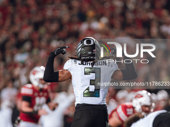 Oregon defensive back Brandon Johnson #3 communicates with his teammates against the Wisconsin Badgers at Camp Randall Stadium in Madison, W...