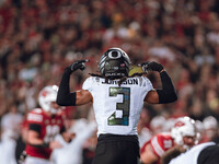 Oregon defensive back Brandon Johnson #3 communicates with his teammates against the Wisconsin Badgers at Camp Randall Stadium in Madison, W...