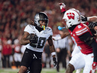 Oregon running back Jordan James #20 finds an opening on the edge for a touchdown against the Wisconsin Badgers at Camp Randall Stadium in M...