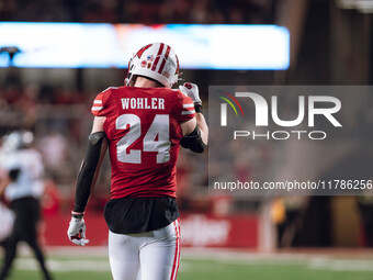 Wisconsin Badgers safety Hunter Wohler #24 celebrates a defensive stop against the Oregon Ducks at Camp Randall Stadium in Madison, Wisconsi...