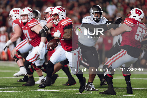 Wisconsin Badgers running back Tawee Walker #3 takes the ball upfield against the Oregon Ducks at Camp Randall Stadium in Madison, Wisconsin...