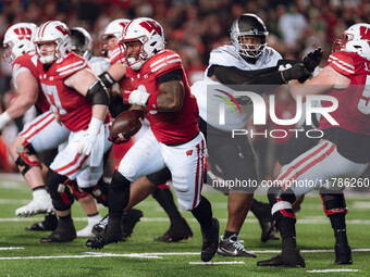 Wisconsin Badgers running back Tawee Walker #3 takes the ball upfield against the Oregon Ducks at Camp Randall Stadium in Madison, Wisconsin...