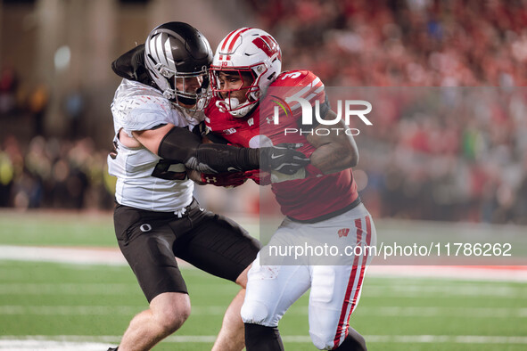 Wisconsin Badgers running back Tawee Walker #3 takes the ball upfield against the Oregon Ducks at Camp Randall Stadium in Madison, Wisconsin...