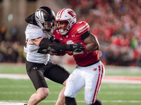 Wisconsin Badgers running back Tawee Walker #3 takes the ball upfield against the Oregon Ducks at Camp Randall Stadium in Madison, Wisconsin...