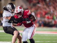 Wisconsin Badgers running back Tawee Walker #3 takes the ball upfield against the Oregon Ducks at Camp Randall Stadium in Madison, Wisconsin...