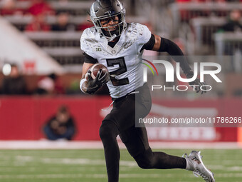 Oregon wide receiver Gary Bryant Jr. #2 runs the ball upfield after a catch against the Wisconsin Badgers at Camp Randall Stadium in Madison...