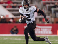 Oregon wide receiver Gary Bryant Jr. #2 runs the ball upfield after a catch against the Wisconsin Badgers at Camp Randall Stadium in Madison...